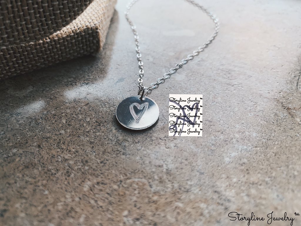 Handwritten: The Disc Necklace
