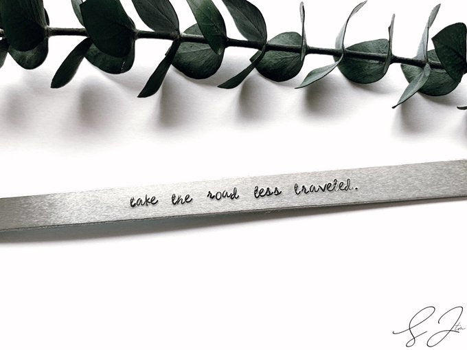 'take the road less traveled.' Cuff Bracelet